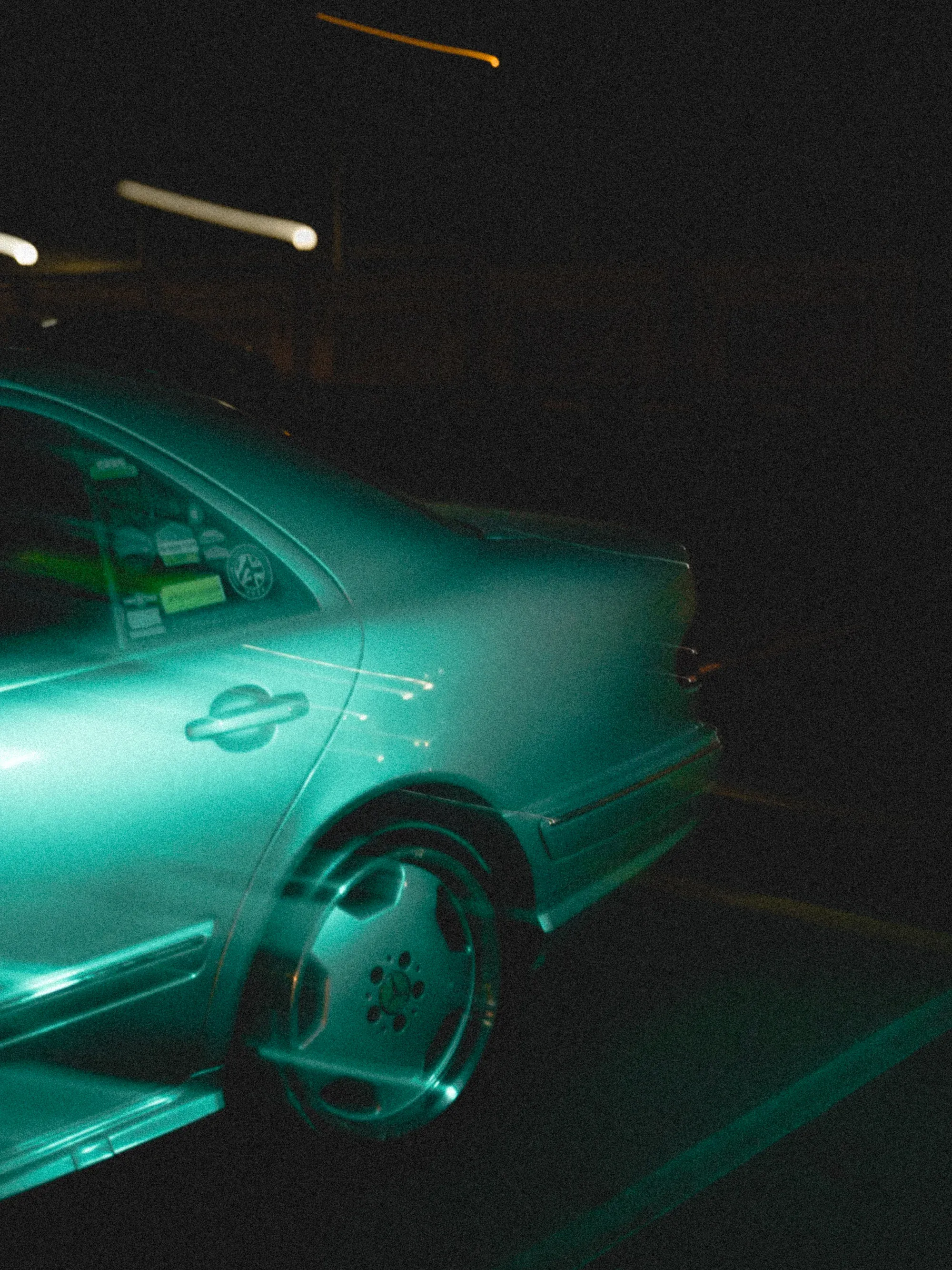 Motion blur of car headlights at night, futuristic light streaks.
