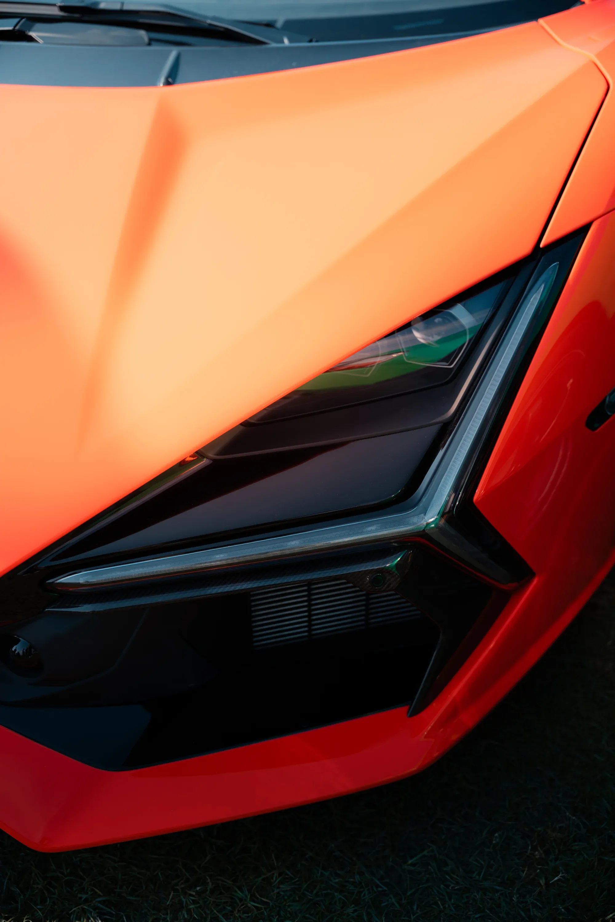 Close-up of custom car modifications, high contrast style.